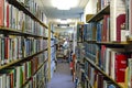 A Man in a Library searching for a book