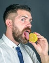 Man lick lemon. Vegetarian, health and wellbeing. Fruit and healthy organic food. Dieting and fitness. Vitamin citrus at Royalty Free Stock Photo