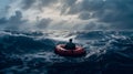 A man on a lifeboat sails on the open sea Royalty Free Stock Photo