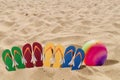 Man lifestyle four relax flip flops on orange beach sand and vol Royalty Free Stock Photo