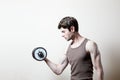 Man lifting dumbbell