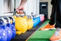 Man lifting kettlebell from floor doing sport Royalty Free Stock Photo