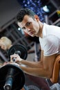 Man lifting weight in a gym Royalty Free Stock Photo