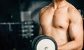 A man working out with equipment in the gym Royalty Free Stock Photo