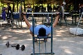 Man Lifting Weights in Lumphini Park