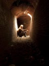 Man in the light of a tunnel