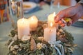 Man lighting candles of Advent wreath Royalty Free Stock Photo