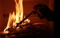 Man lighting up the chimney fire Royalty Free Stock Photo