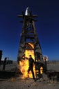 Man LightPainted With Fire in Industrial Setting