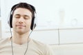 Man listening music with headphones Royalty Free Stock Photo