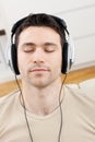 Man listening music with headphones Royalty Free Stock Photo