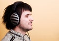 Man listening music in headphones Royalty Free Stock Photo