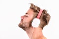 Man listening music headphones white background. Modern technology. Music taste concept. Enjoy perfect music sound Royalty Free Stock Photo