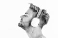 Man listening music headphones white background. Modern technology. Music taste concept. Enjoy perfect music sound Royalty Free Stock Photo