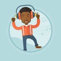Man listening to music in headphones and dancing. Royalty Free Stock Photo