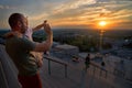 Man with a little girl in his arms, watching the sunset over Montreal on an evening of summer. Parenting care, father Royalty Free Stock Photo