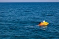 A man and a little girl swim with inflatable coils in the sea water and are hit by a big wave in turkey. Holidays, travel, Royalty Free Stock Photo