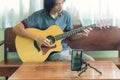 The man live traing the guitar practice streaming Royalty Free Stock Photo