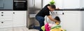 Man Loading Clothes Into Washing Machine Royalty Free Stock Photo