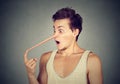 Man with long nose. Liar concept. Royalty Free Stock Photo