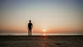 A man look at the sunset at the beach. Royalty Free Stock Photo