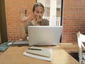 A man look to laptop computer surprised,Shocked Asian man with h Royalty Free Stock Photo