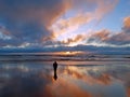 Man looking at beautiful sunset at the atlantic ocean Royalty Free Stock Photo