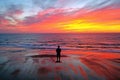 Man looking at beautiful sunset at the atlantic ocean Royalty Free Stock Photo