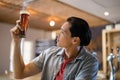 Man looking at beer glass in a restaurant Royalty Free Stock Photo