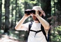 Man looking through the binoculars Royalty Free Stock Photo