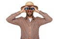 Man looking binoculars with traveler hat isolated over white background. Royalty Free Stock Photo