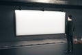 Man looking on blank billboard Royalty Free Stock Photo