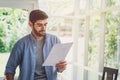 A man looking at business plan in the paper Royalty Free Stock Photo