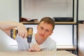Man looking at camera during drilling Royalty Free Stock Photo