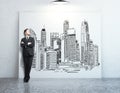 Man looking at city sketch Royalty Free Stock Photo