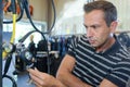Man looking at diving apparatus Royalty Free Stock Photo