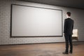 Man looking at empty billboard Royalty Free Stock Photo