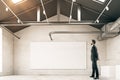 Man looking at empty billboard Royalty Free Stock Photo