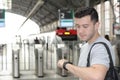 Man looking at his watch in the train station Royalty Free Stock Photo