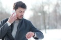 Man looking on his watches Royalty Free Stock Photo