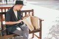 Man looking inside shopping bag Royalty Free Stock Photo