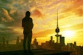 Man looking at kuwait city skyline