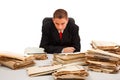 Man looking at lots of documents Royalty Free Stock Photo