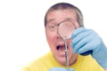 Man looking at mite through magnifier, isolated on white background