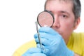 Man looking at mite through magnifier, isolated on white background