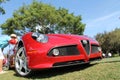 Man looking at Modern alfa romeo