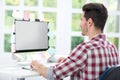 Man looking at a monitor with sticky note on it Royalty Free Stock Photo