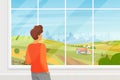 Man looking out window at summer peaceful countryside landscape and city on horizon Royalty Free Stock Photo