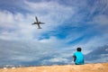 Man looking over to aircraft at phuket thailand