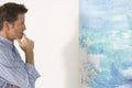 Man Looking At Painting In Art Gallery Royalty Free Stock Photo